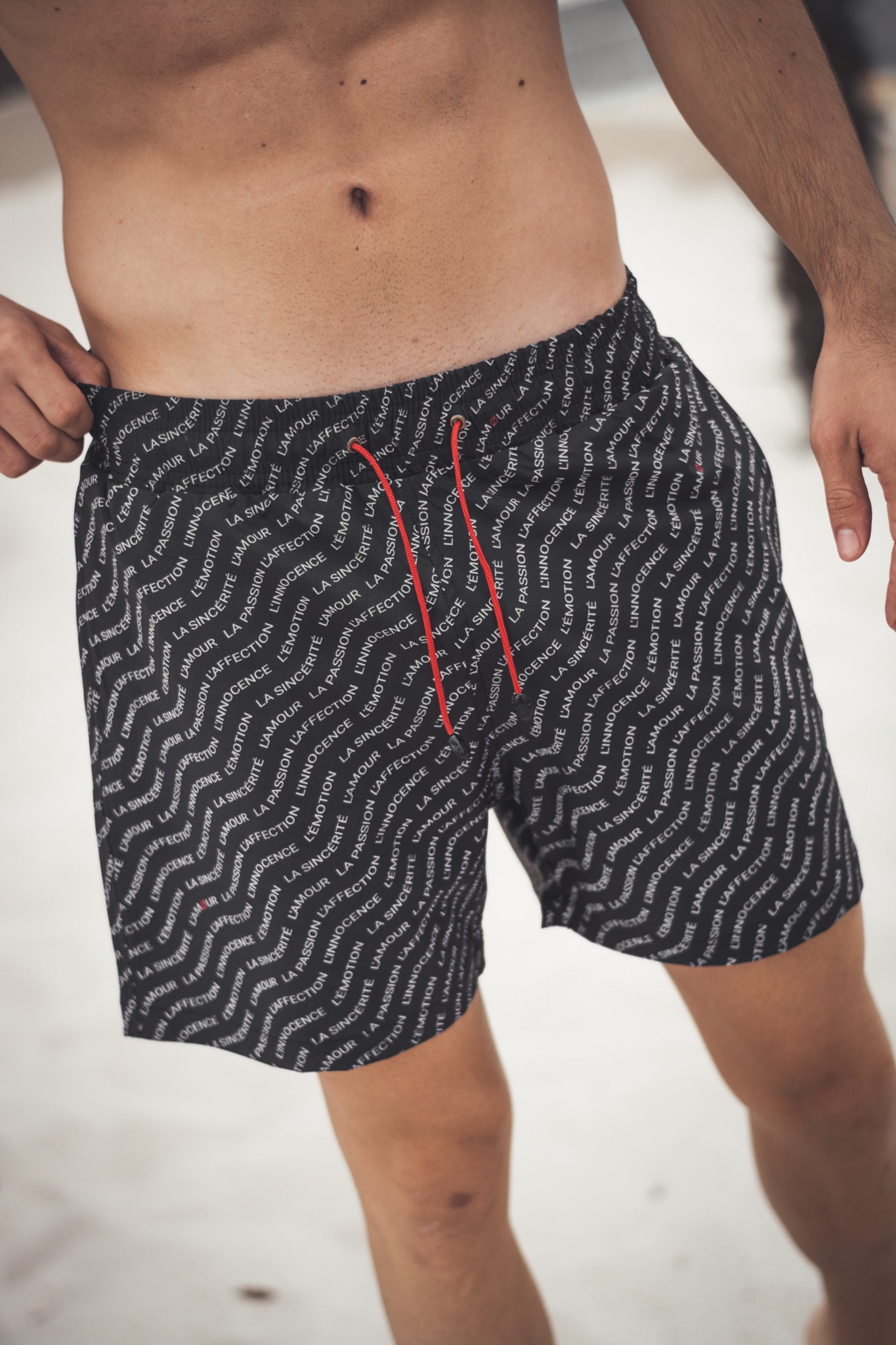 'Les émotions' black swimsuit men
