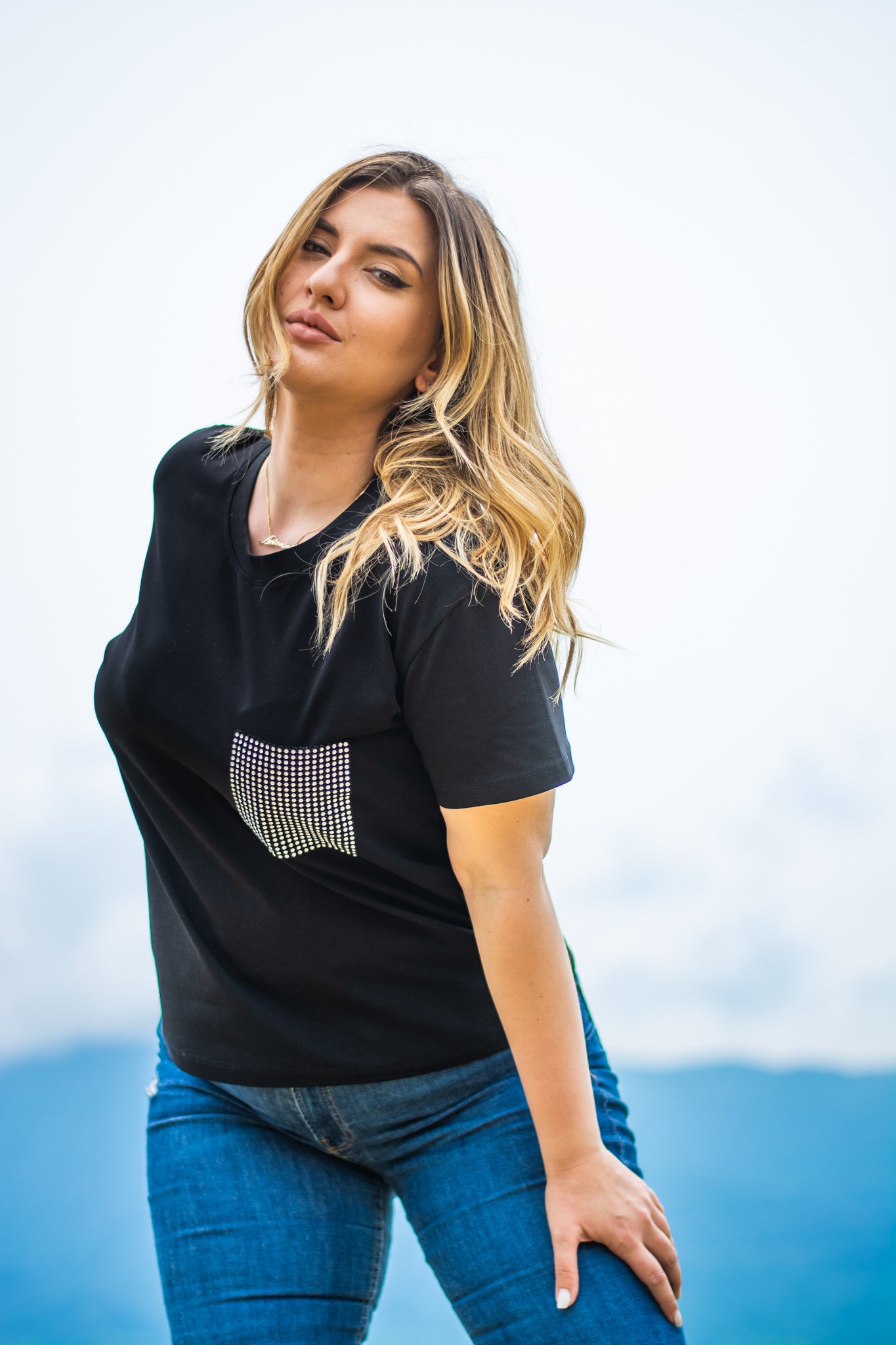 Women black cotton t-shirt with a crystal pocket