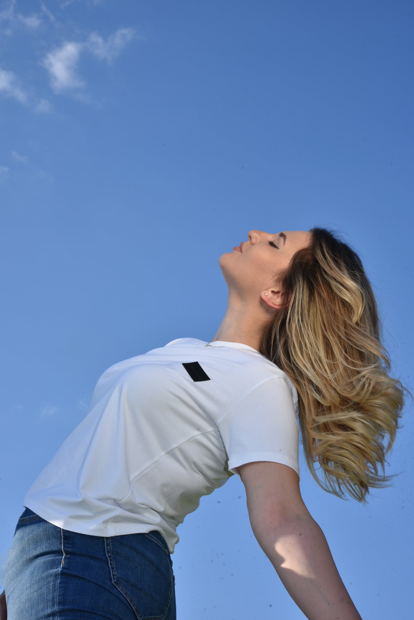 Women white cotton t-shirt with black logo badge