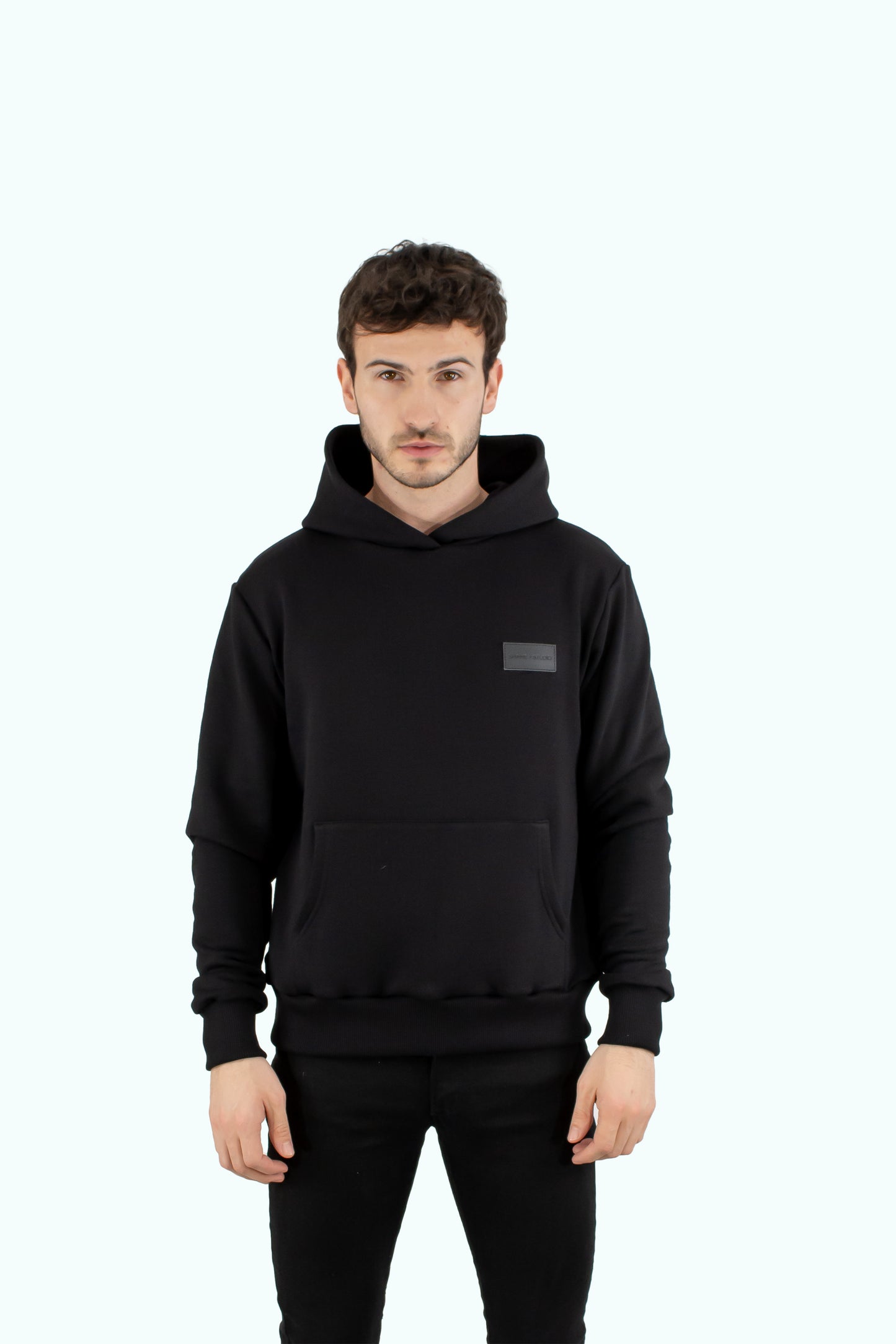 Men black hoodie with black logo badge