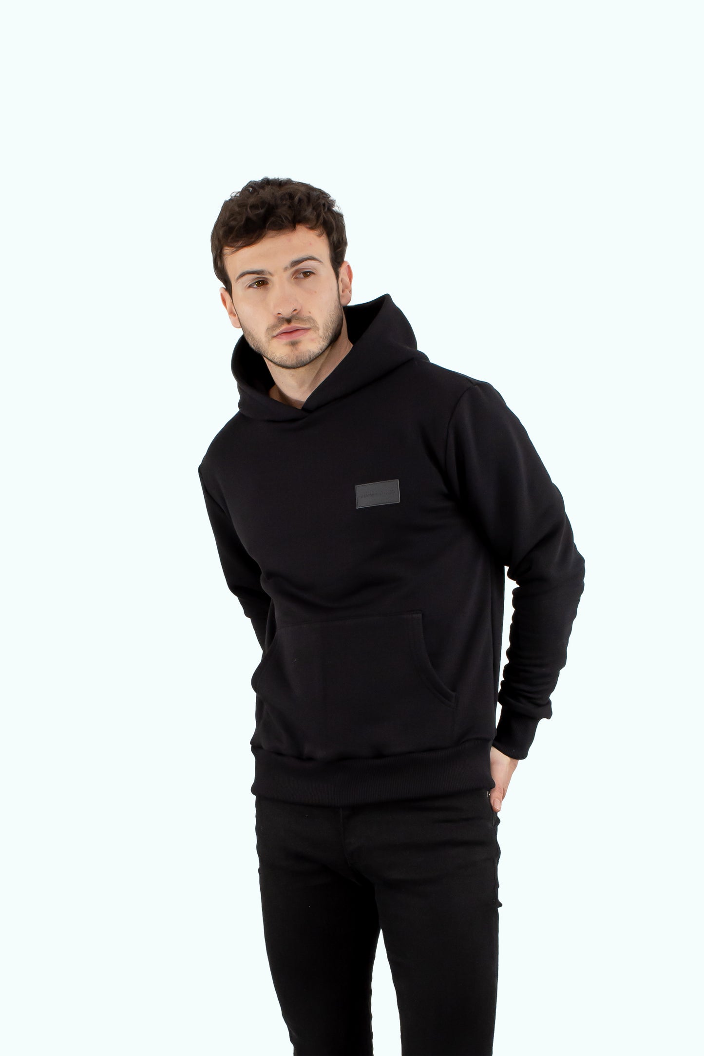 Men black hoodie with black logo badge