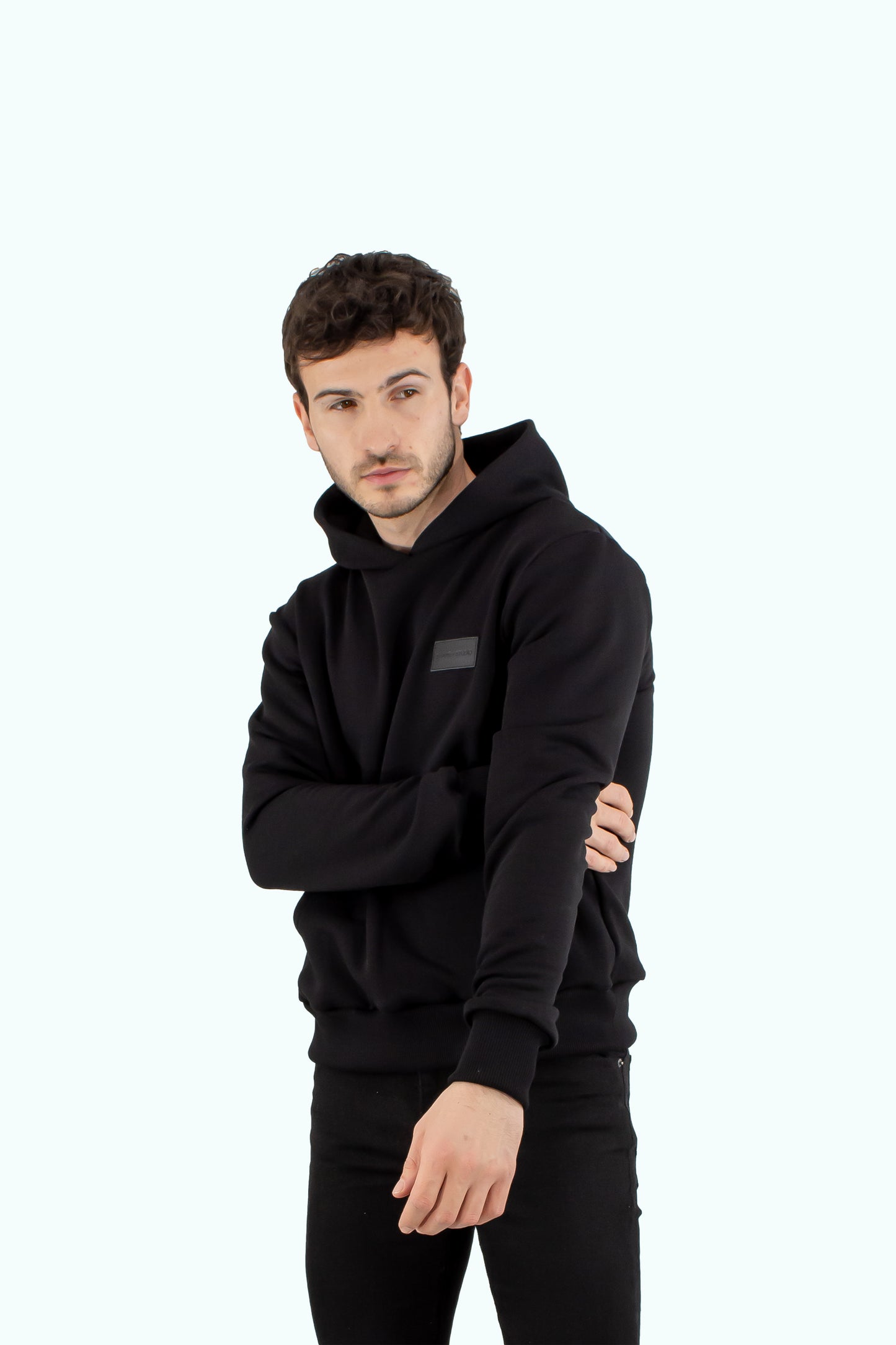 Men black hoodie with black logo badge