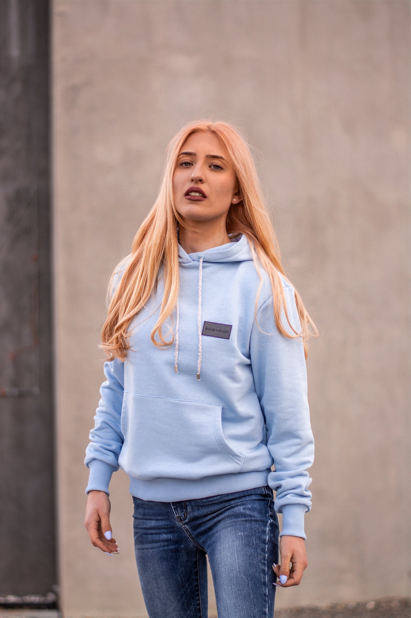 Women Baby Blue Hoodie with logo badge