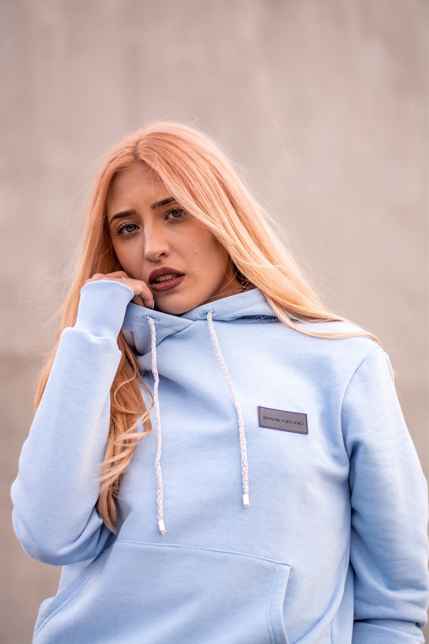 Women Baby Blue Hoodie with logo badge