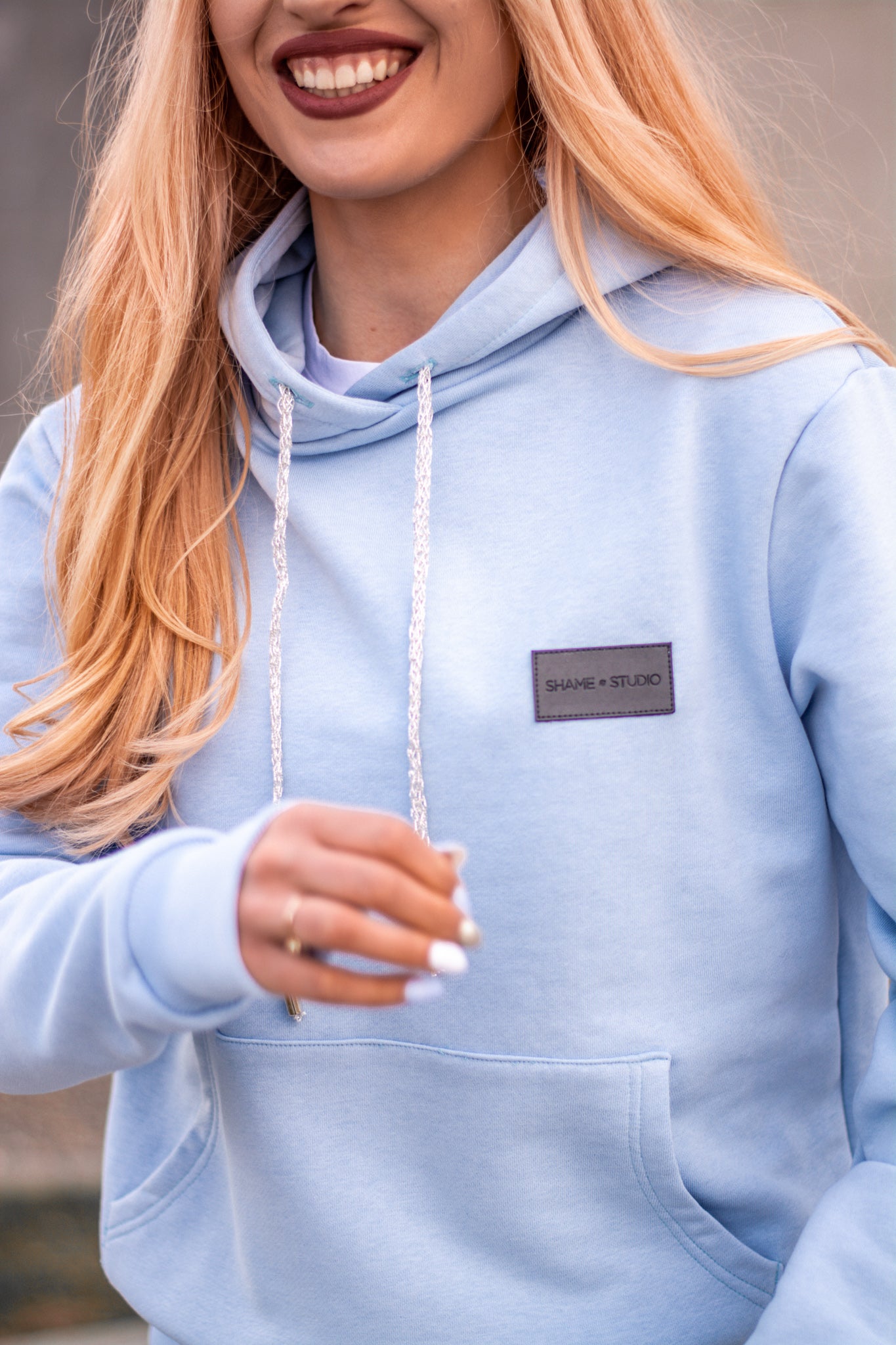 Women Baby Blue Hoodie with logo badge