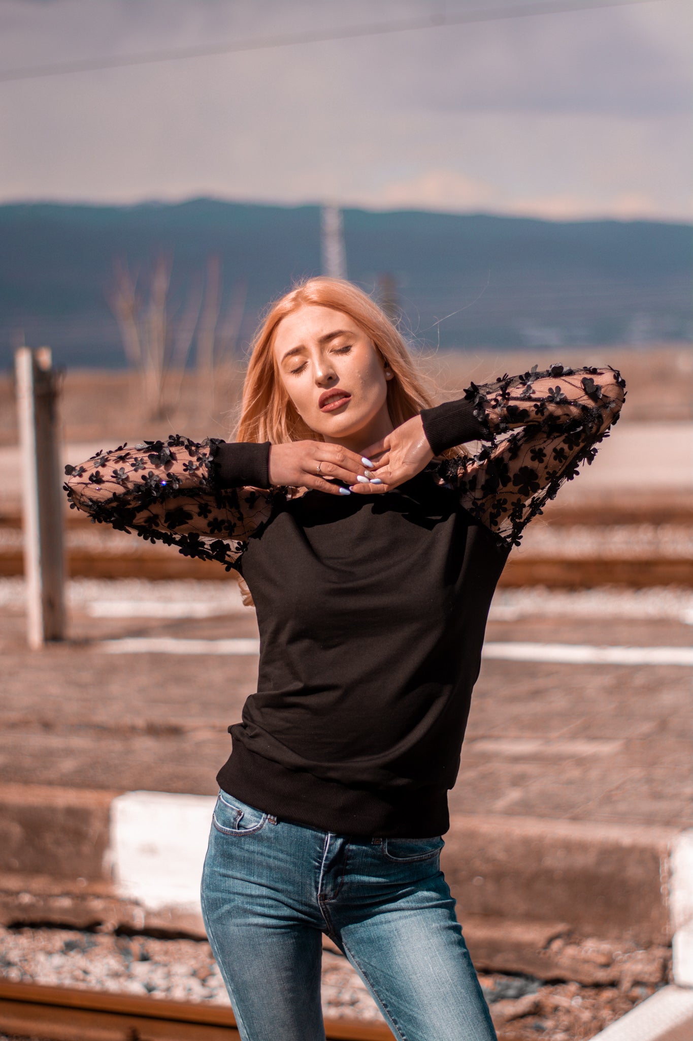 Women black blouse transparent sleeves with embroidered flowers