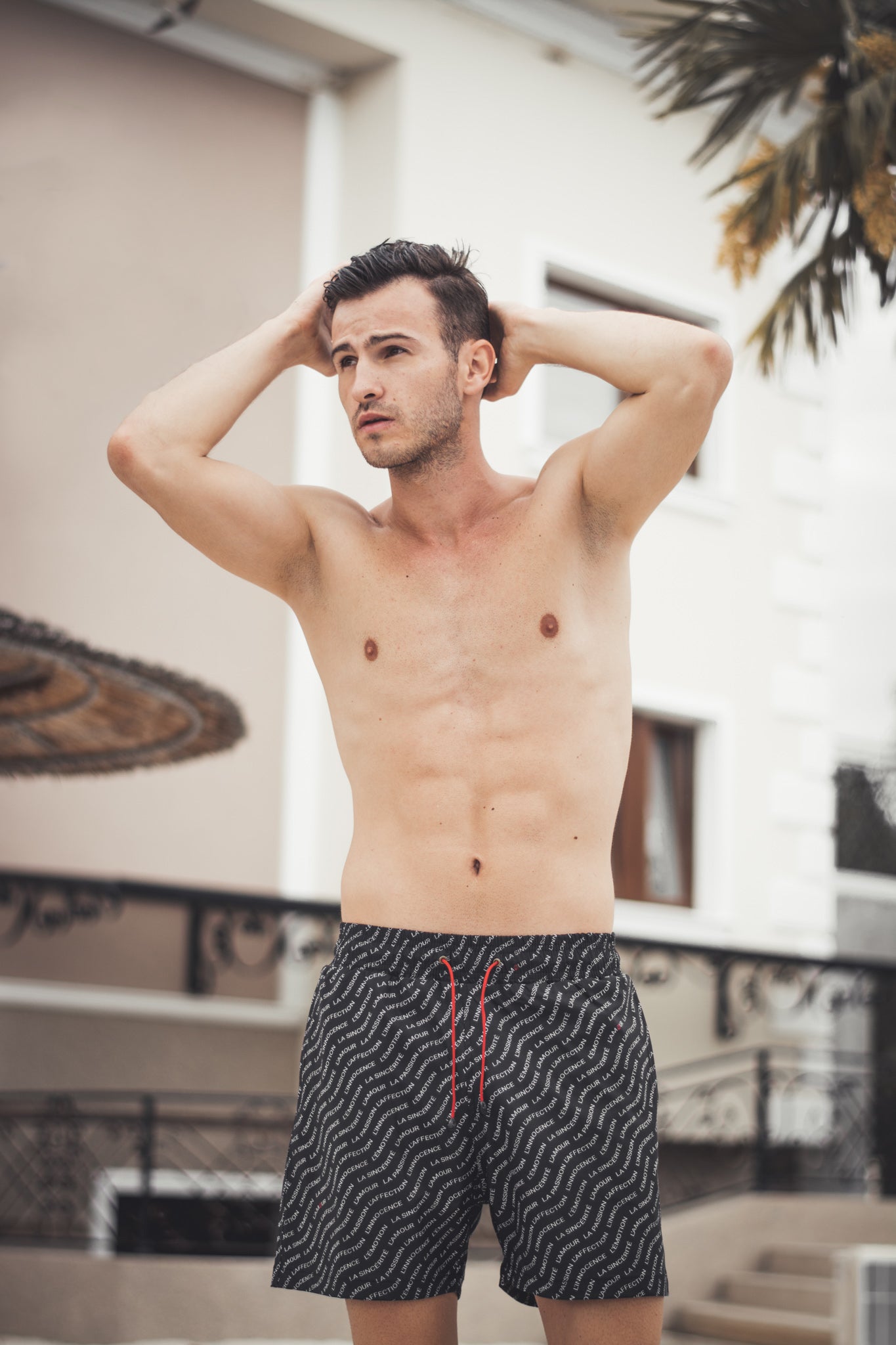 'Les émotions' black swimsuit men