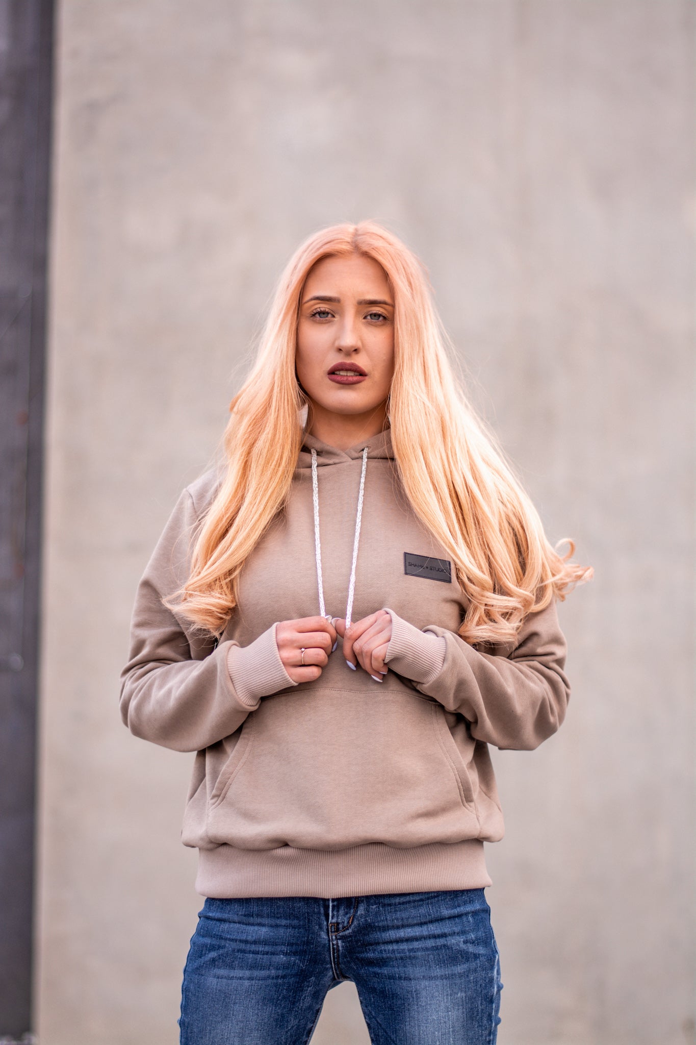 Women beige hoodie with logo badge